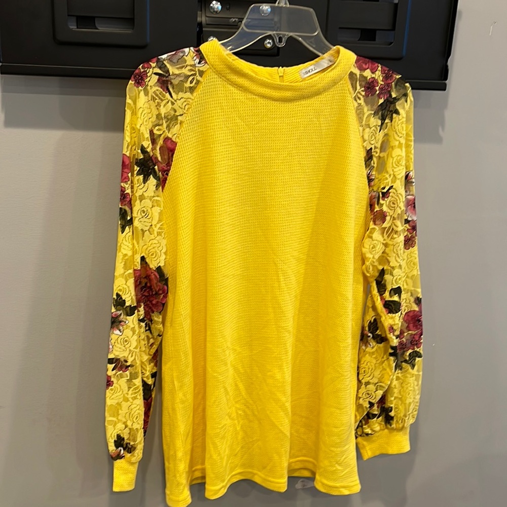 Miholl size large top with long sleeves. Lacy and colorful sleeves.